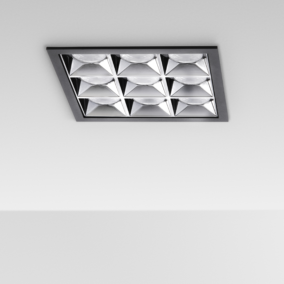 Modern 3x3 cell square ceiling light fixture on a white background