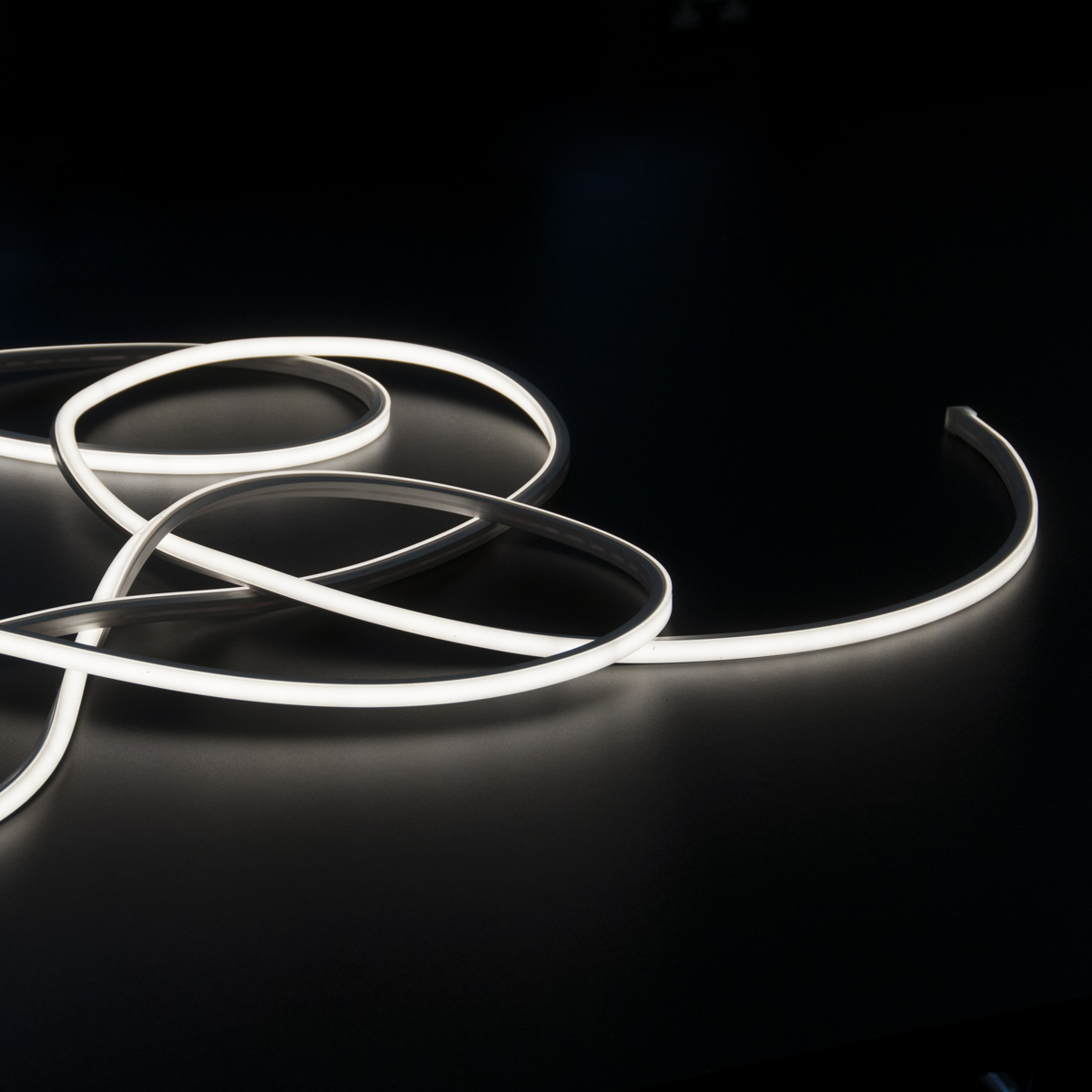 Neon light strip on a black background