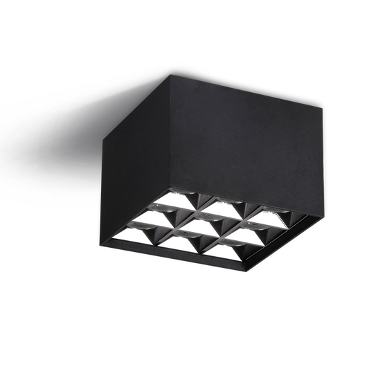 Black square wall light fixture with geometric design on a white background